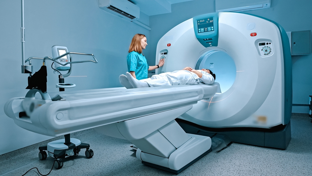 Radiologist consults patient before undergoing diagnostics using magnetic resonance imaging