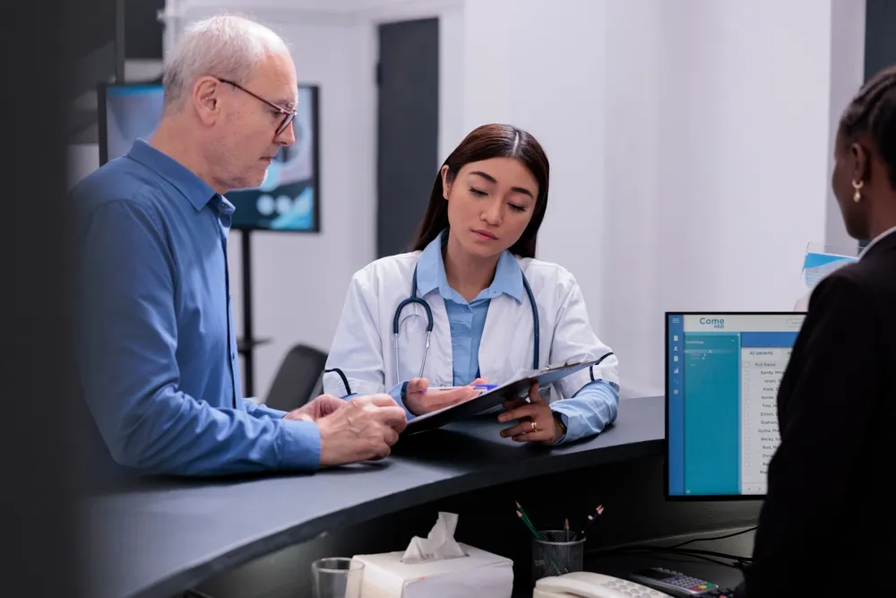 Medic prescribing medication to help manage the man chronic pain.